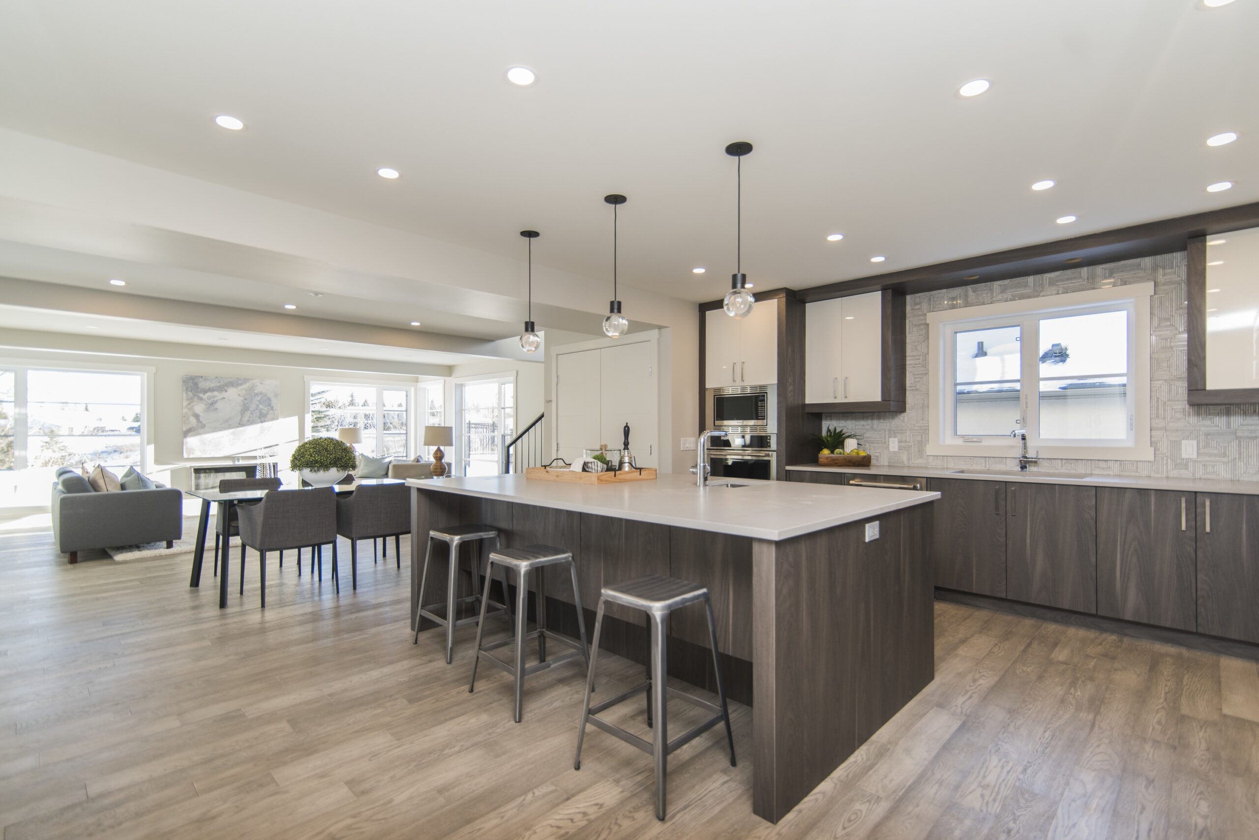 Beautiful shot of a modern house kitchen and dining room A beautiful shot of a modern house kitchen and dining room